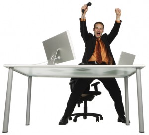 Image of happy man at desk